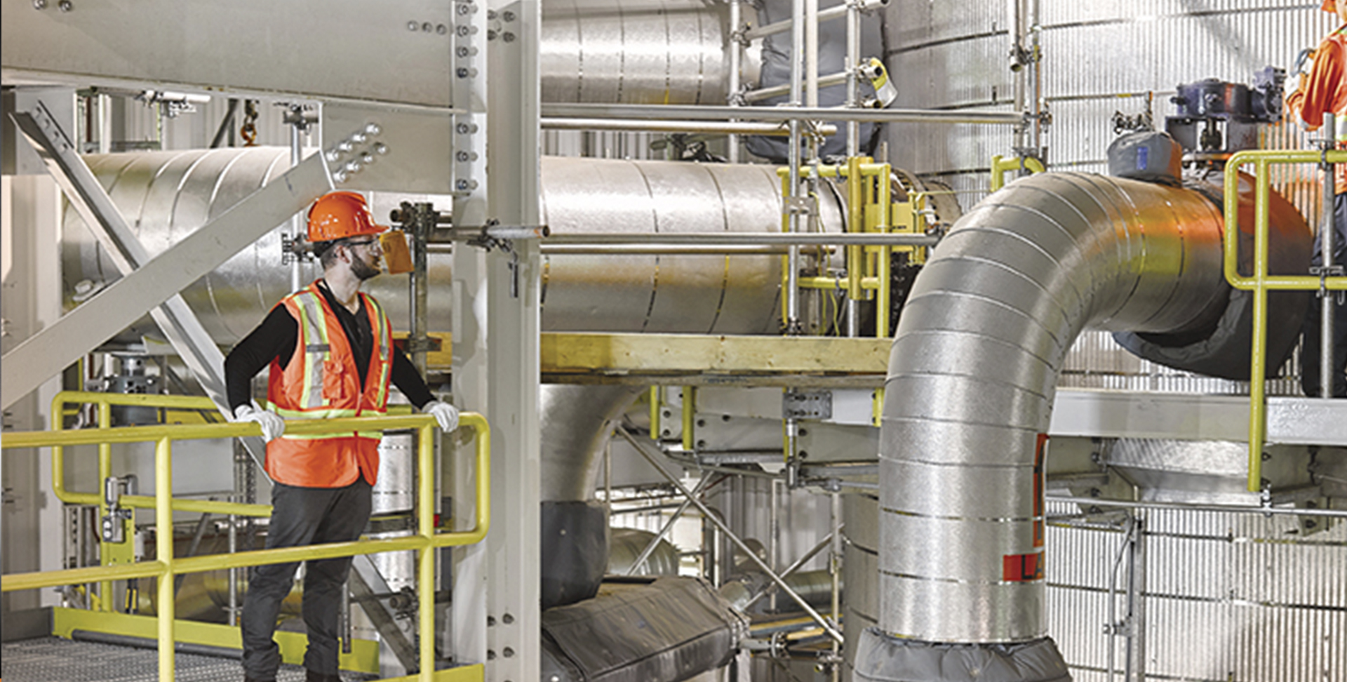 Employees working inside the Carbon Capture facility.